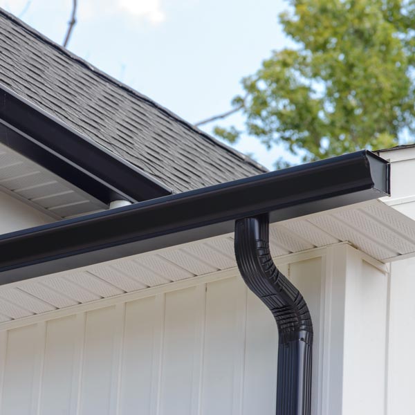 newly installed gutters and downspout on home