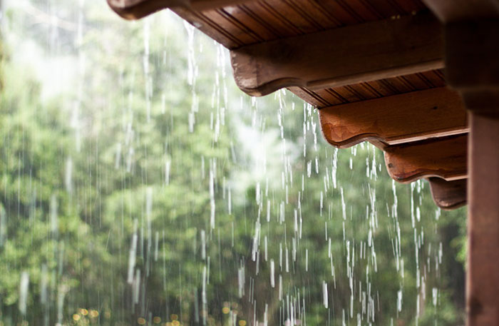 rain falling water from a roof